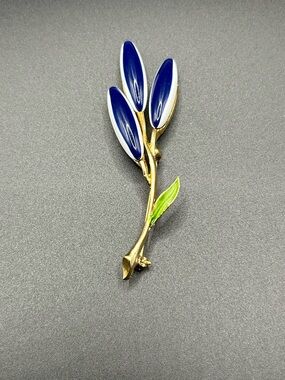 Gold Branch Brooch with Navy Enamel Petals and Green Leaf